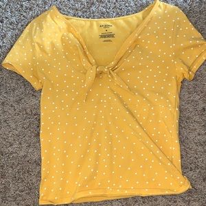 Yellow polka dot short sleeved shirt